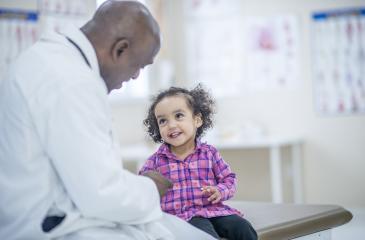 Doctor with young patient 