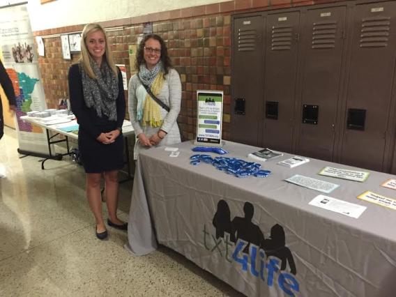 Task force members and Carlton County Public Health team members Meghann Levitt and Joanne Erspamer at a Community Forum's resource table.
