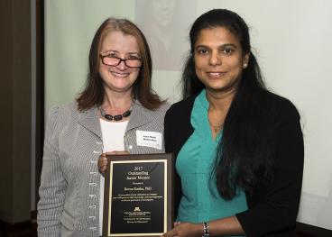 Dr. Reena Kartha and Award Plaque